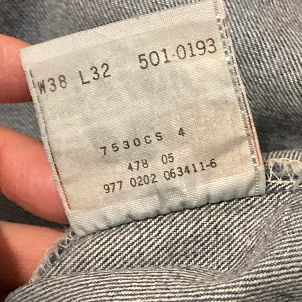 Vintage 00s Levi's 501xx button fly denim‎ paper tag